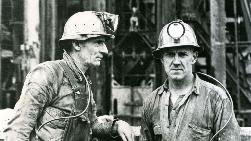 Two miners in hardhats