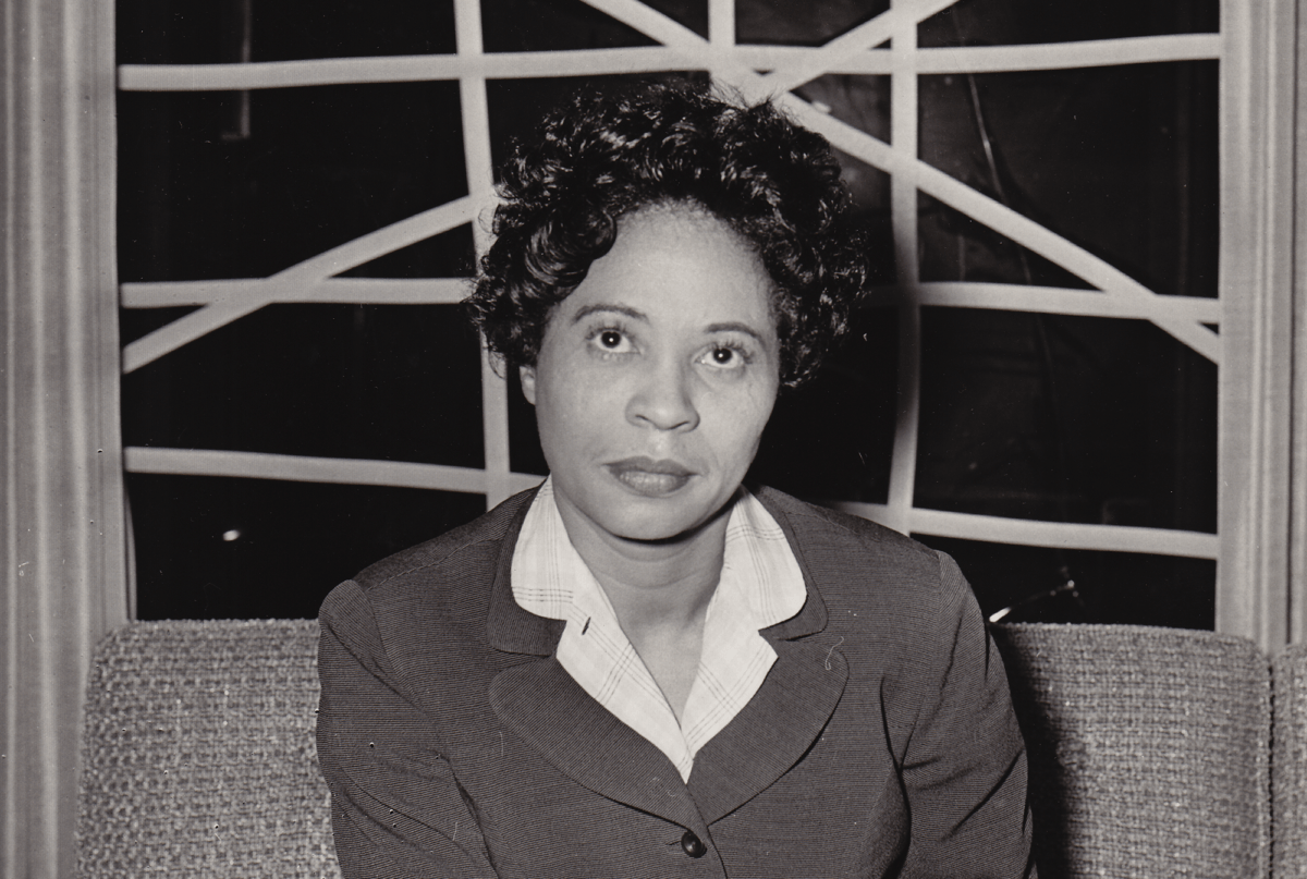 Young woman (Daisy Bates) looking into camera