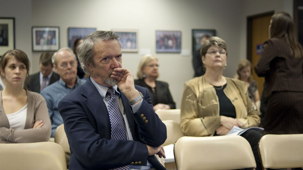 A man sits in a Texas Board of Education meeting to debate the content of public school textbooks.