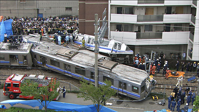 Site of Amagasaki train crash with emergency services