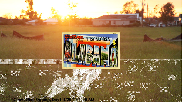 Postcard reading "Greetings from Alabama" against photograph of sunrise in the suburbs.