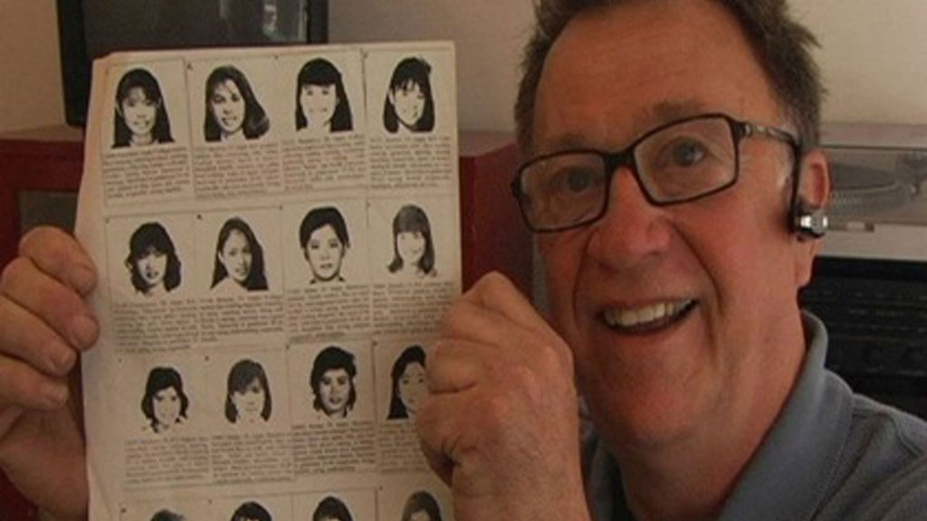 Steve holds up flier with headshots and bios of Asian women.