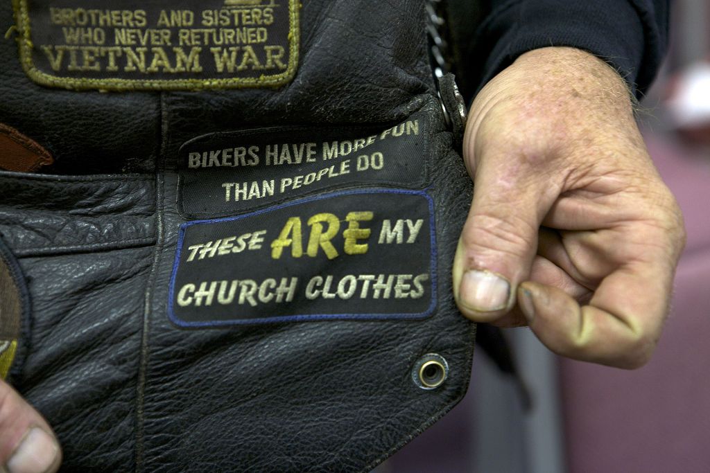 Close-up of biker vest patch that reads, "These are my church clothes."