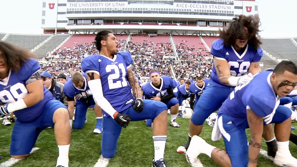 High school football players perform a traditional Polynesian war chant.