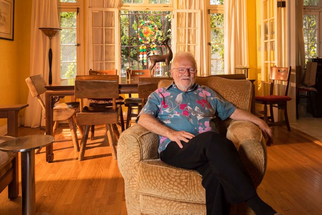 Tony Sullivan in the living room of the home he shared with late partner Richard Adams for decades