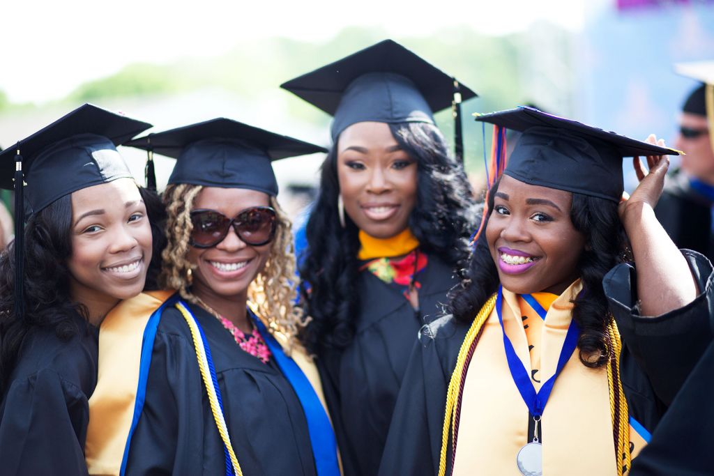 Young African American women graduating from college