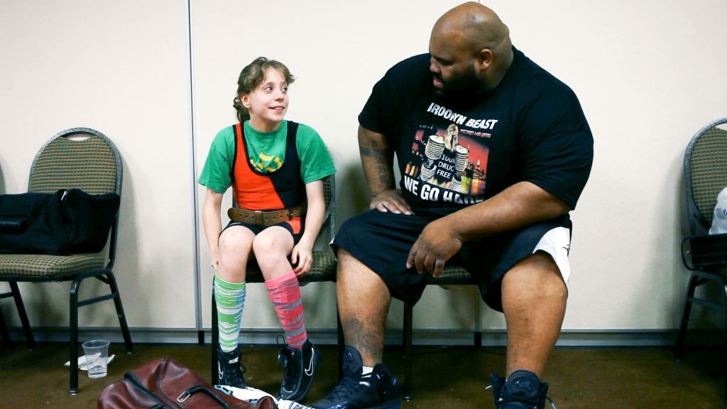 Naomi Kutin and a slightly bigger male powerlifter, from Supergirl