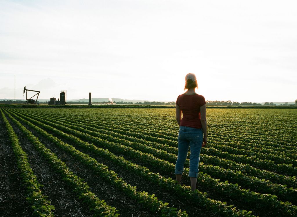 north dakota woman in farm field, from My Country No More