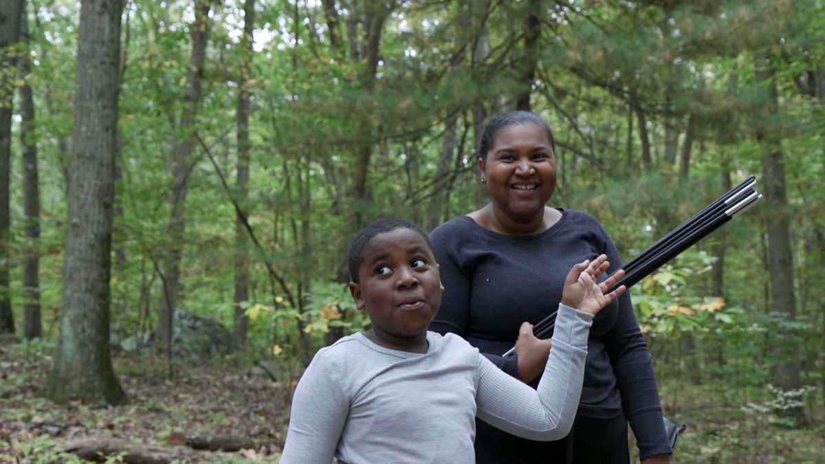 Dasan and his mother out in the woods, from Tre Maison Dasan