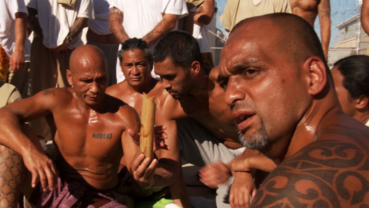 Subject Hale Gualderama and other native Hawaiian religion members engaging in cultural practice.