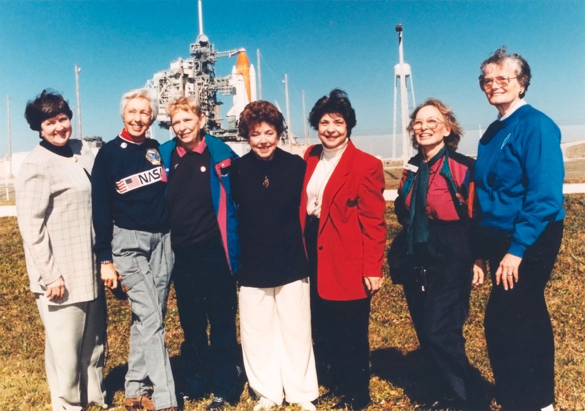 At the Kennedy Space Center, seven women who once aspired to fly into space stand outside Launch Pad 39B neat the Space Shuttle Discovery, poised for liftoff on the first flight of 1995. They are members of the First Lady Astronaut Trainees (FLATs, also known as the "Mercury 13"). Public domain image.