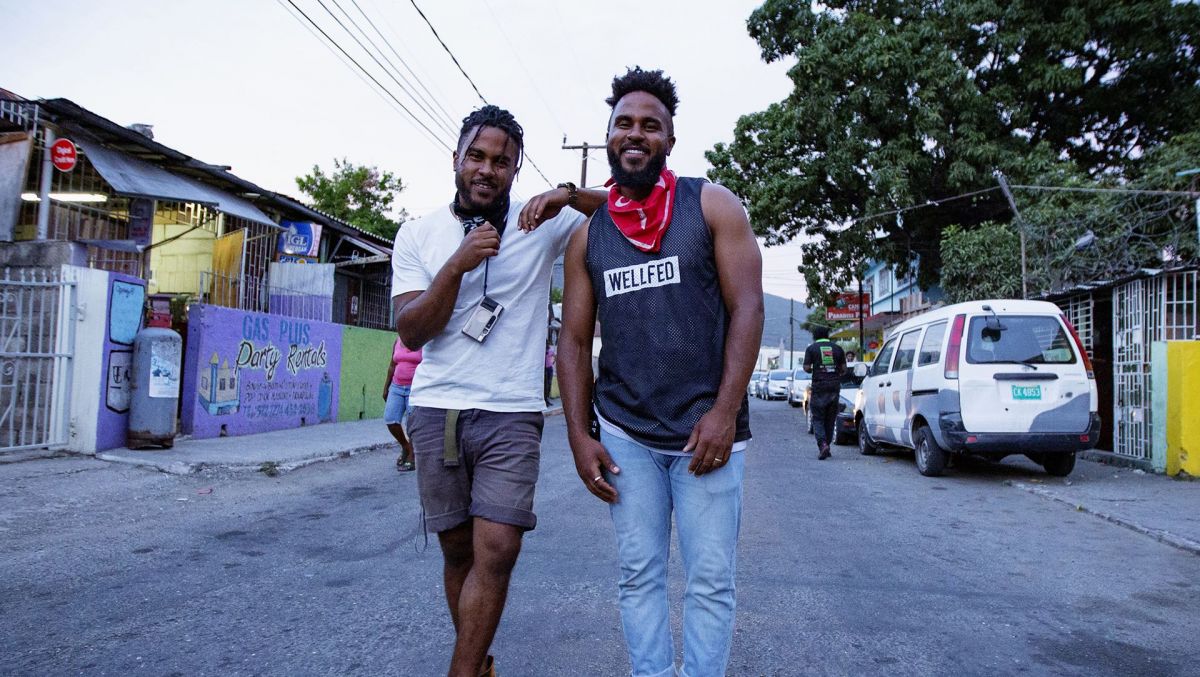 Jamaican-American twins Ron and Don Brodie standing in middle of street in Jamaica