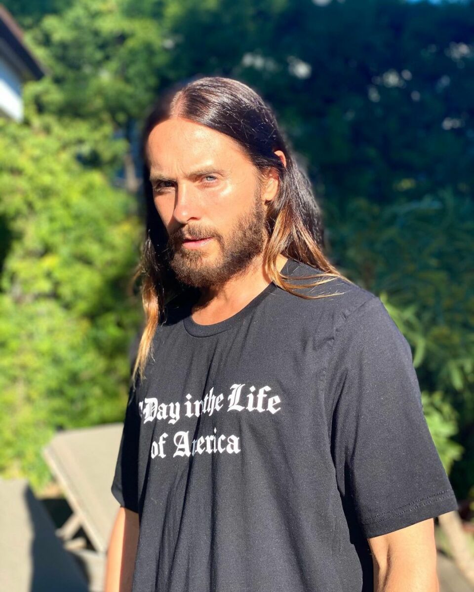 Jared Leto wearing a black Day in the Life of America t-shirt