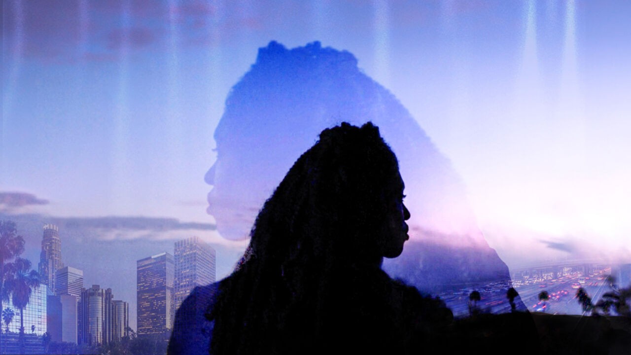 A woman with her hair in braids is superimposed over a purple-hued Los Angeles at dusk.