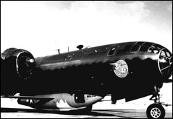 The B-29 parked on the runway with X-1 slung beneath it