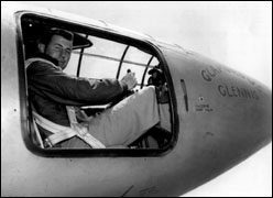 Yeager sitting in cockpit of the X-1, with door off