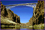 Photo of deep gorge with arch bridge in place