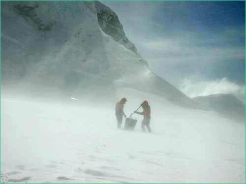 climbers in blowing snow