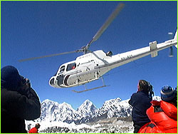 Helicopter taking off from base camp