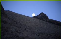 Moon over rocks