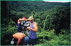 Howard
Hall, Bob Cranston (beige hat), and Billy Holdson on location above Chatham
Bay.