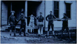 Picture of men with wolf pelt, from late 1800's or early 1900s